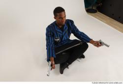 Garson SITTING POSE WITH GUNS